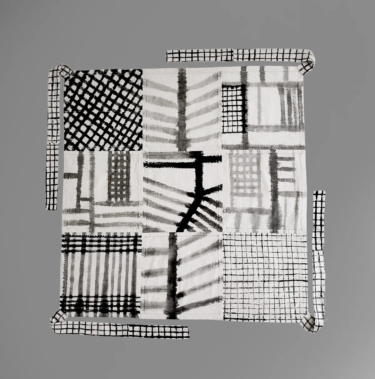 Hanok, a cloth bojagi pieced from panels drawn in sumi ink